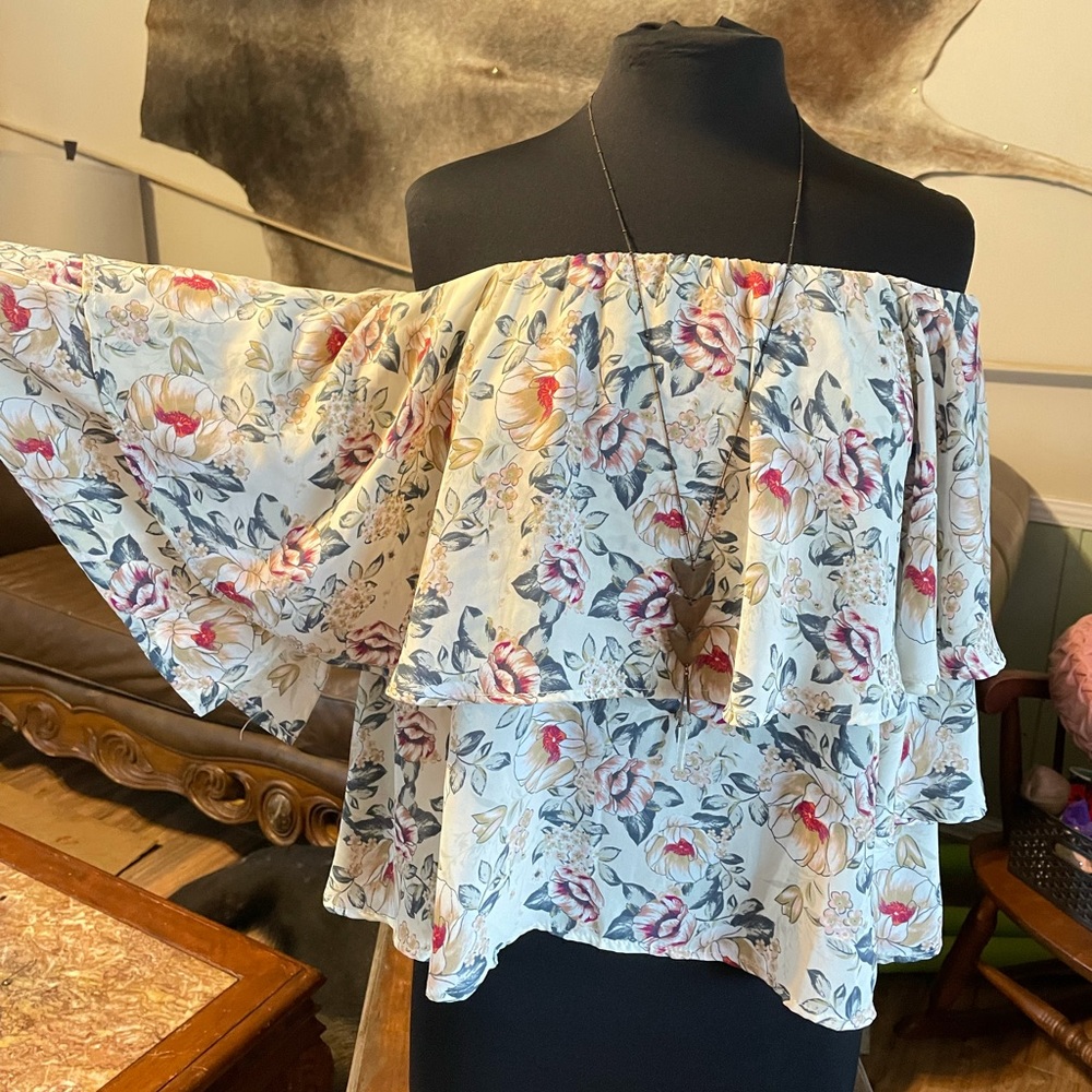 Off the shoulder floral ruffled sleeve blouse